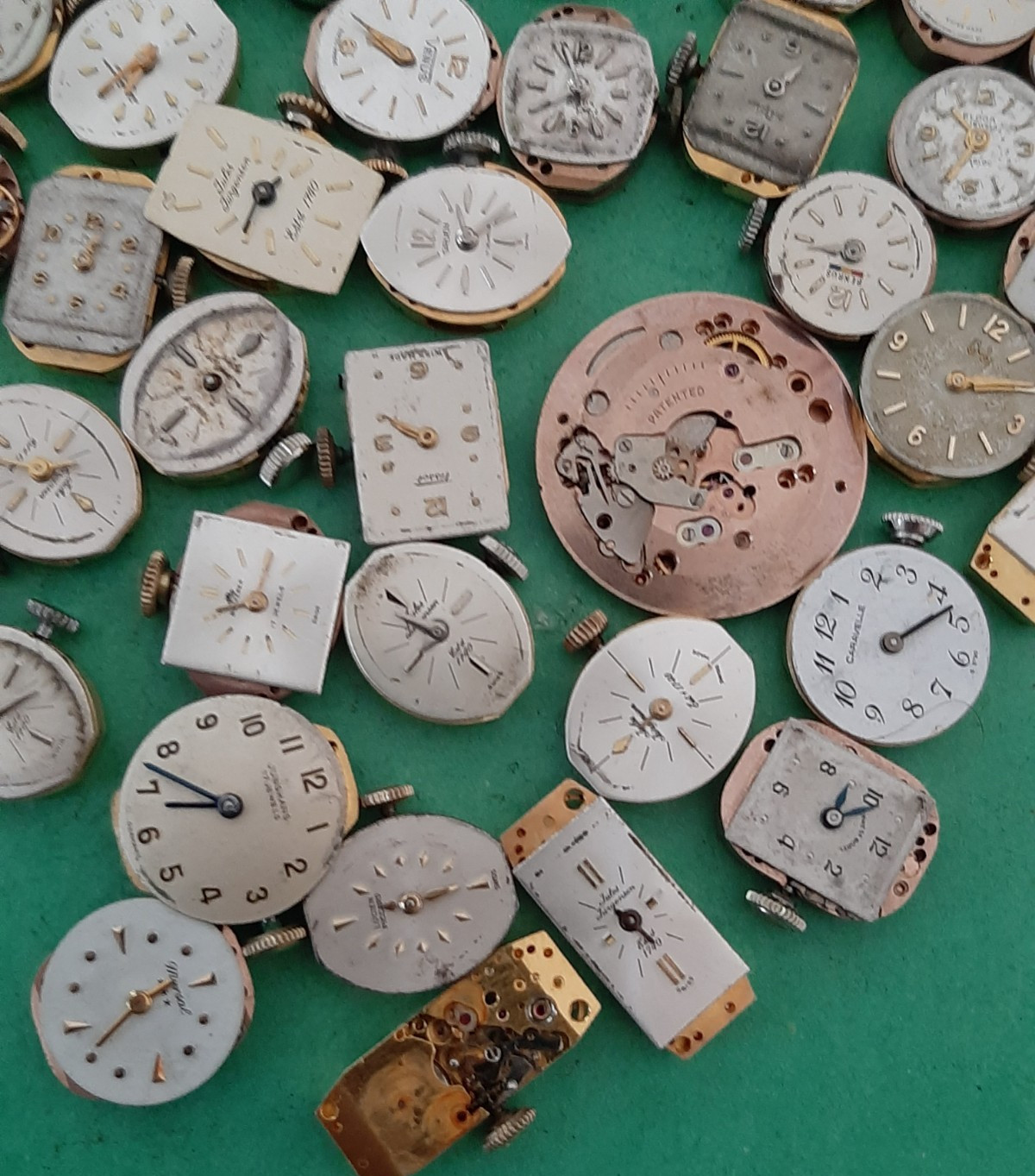 Lot of 60 Mechanical Wrist Watch Movements Parts Repair Manual Gold Cooper Tone