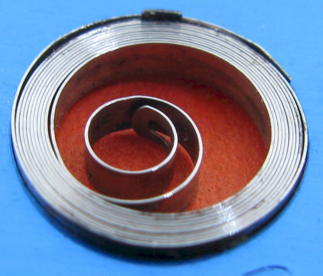 Elgin 21/0s watch part model 533 T end Mainspring white alloy