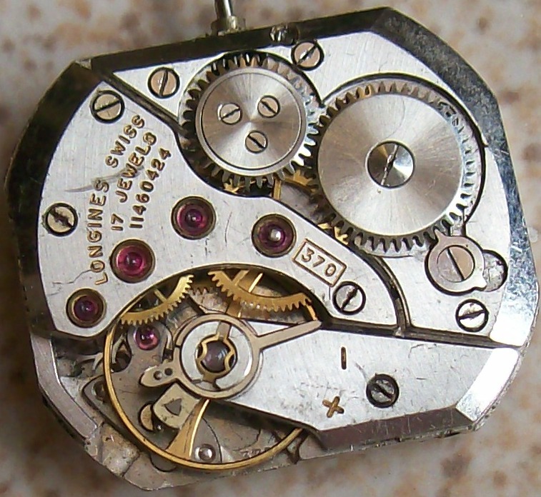 Vintage Longines Cal 370 wristwatch movement 23 mm. x 20 mm. aside