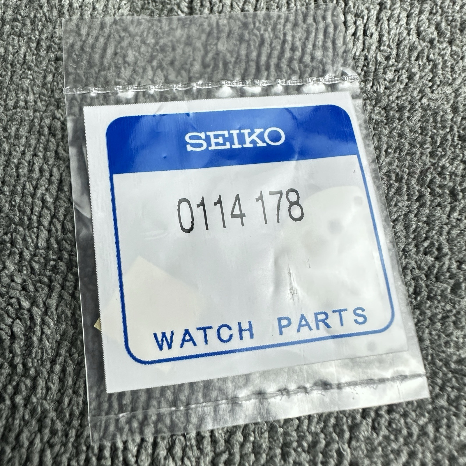 ORIGINAL SEIKO BARREL AND TRAINWHEEL BRIDGE 7S25C 7S26C 7S35C 7S36C / 0114178