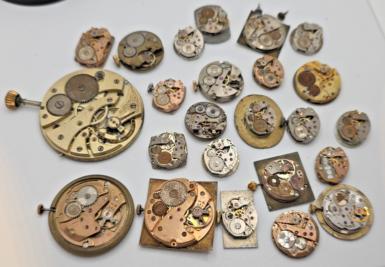 Lot Of 24 Swiss Made Mechanical Movements Complete With Zenith, Revue Dials Etc.