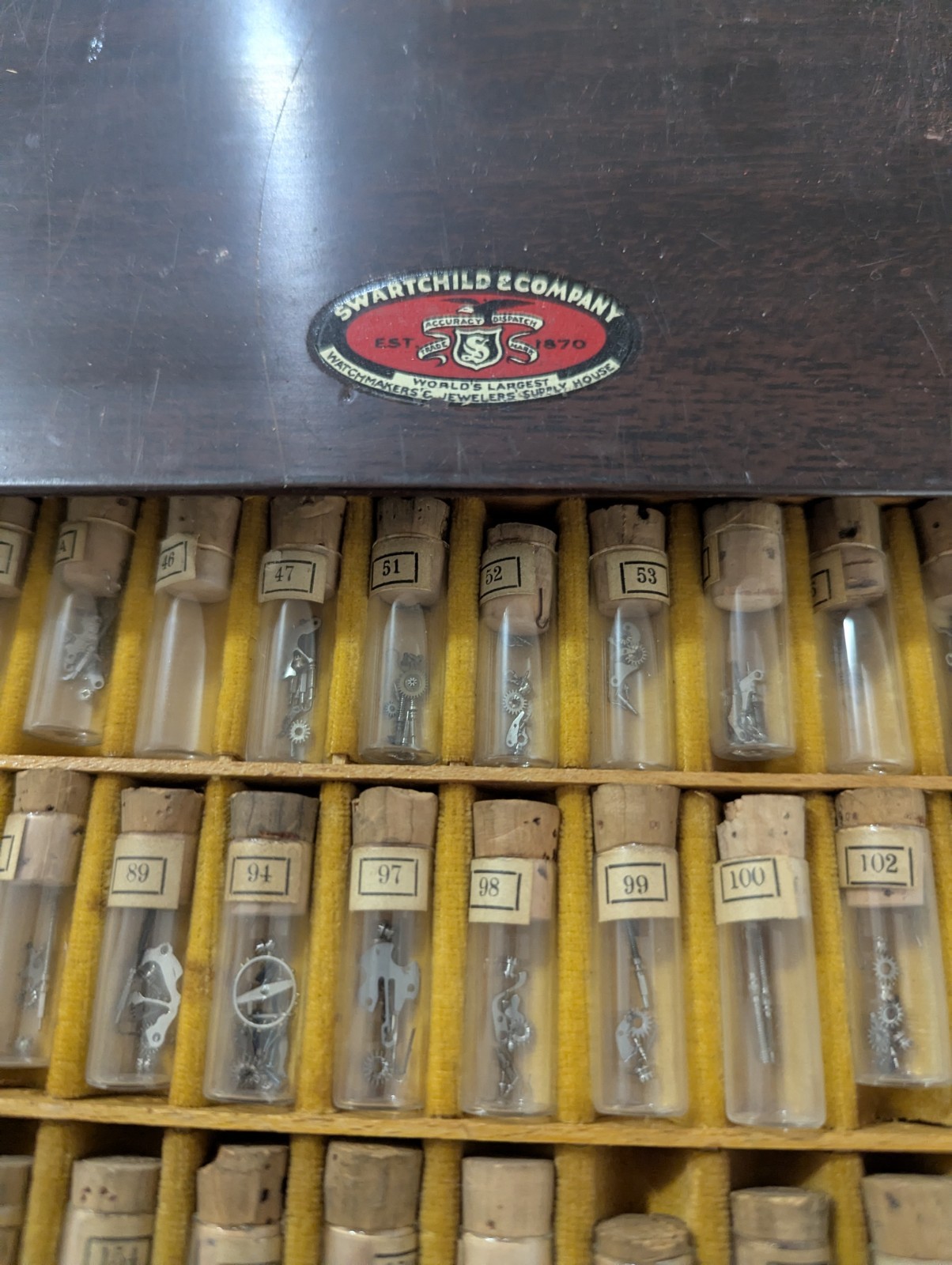 Assortment of Watch Parts – Swartchild & Company Metal Cabinet – 100s of Parts