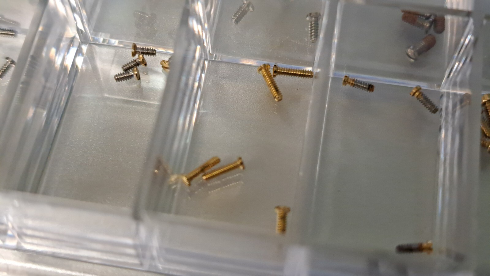 Unbranded miscellaneous watch case back screws. 1 box per order various sizes