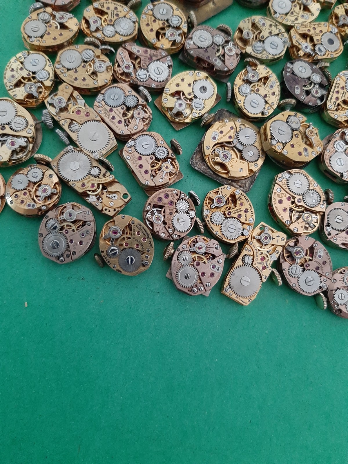 Lot of 60 Mechanical Wrist Watch Movements Parts Repair Manual Gold Cooper Tone