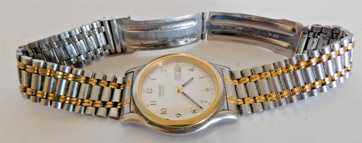 SEIKO QUARTZ DAY & DATE MOVEMENT #7N43 CASE # 7N43-7819 RUNNING. NEEDS SERVICE.