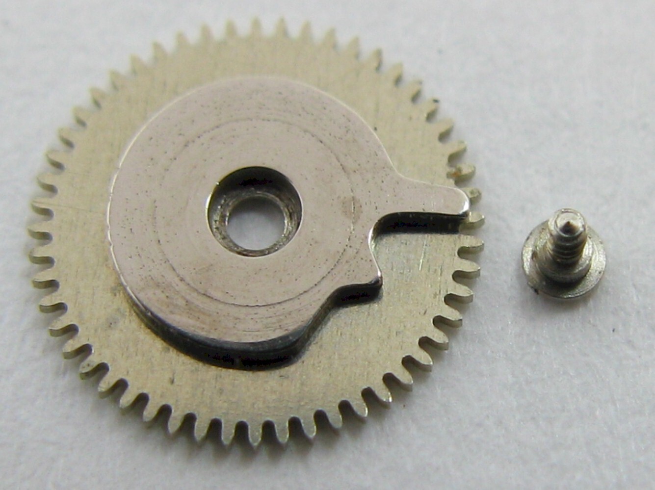 Enicar 1147 watch part: lot with calendar day driving wheel …