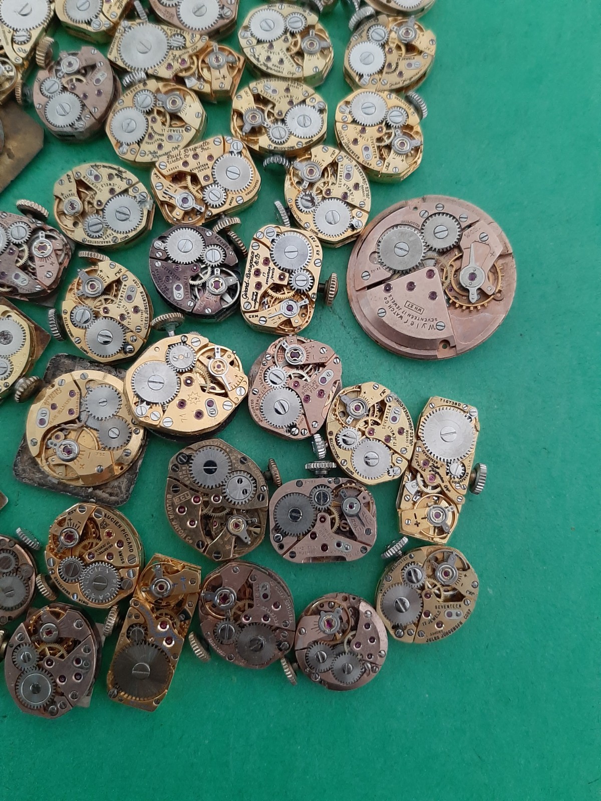 Lot of 60 Mechanical Wrist Watch Movements Parts Repair Manual Gold Cooper Tone