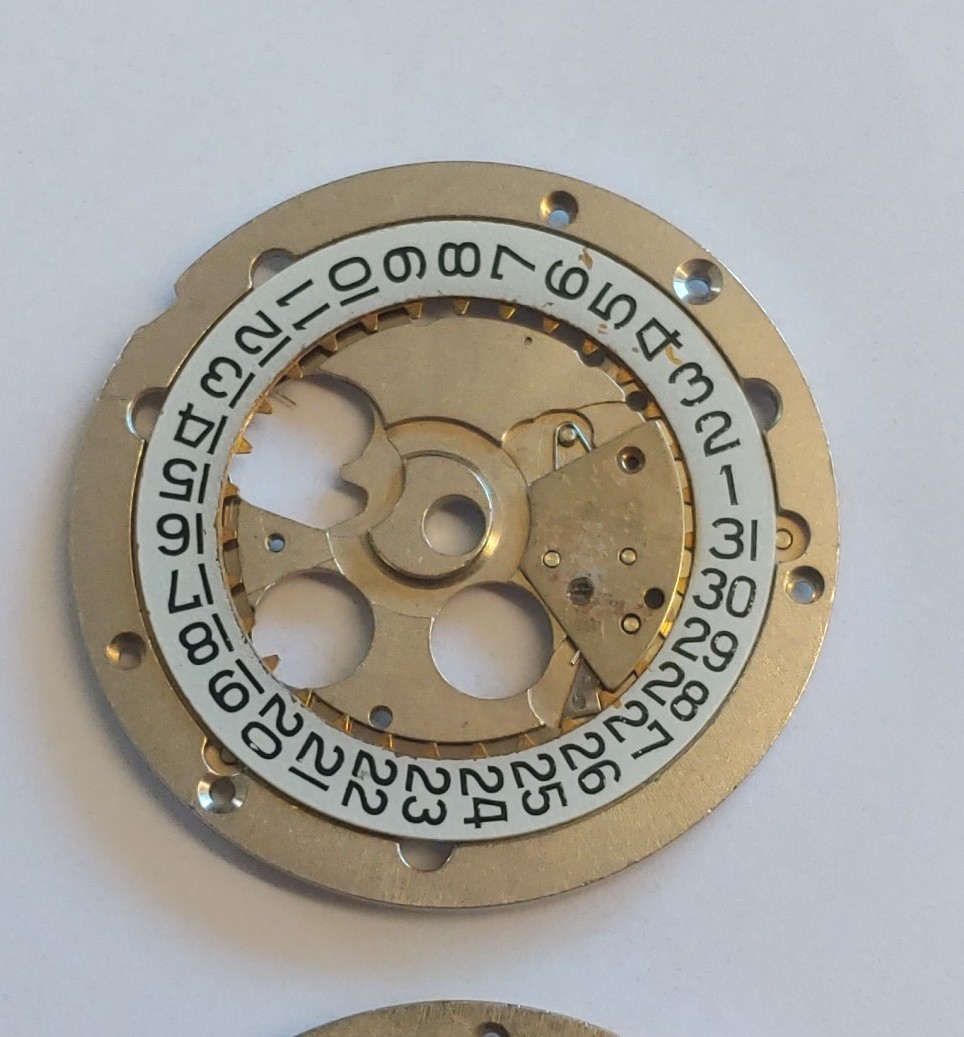 ETA 7750 Dial Plate Ver. 1 With Date Wheel, Black On White Wheel Remaining.