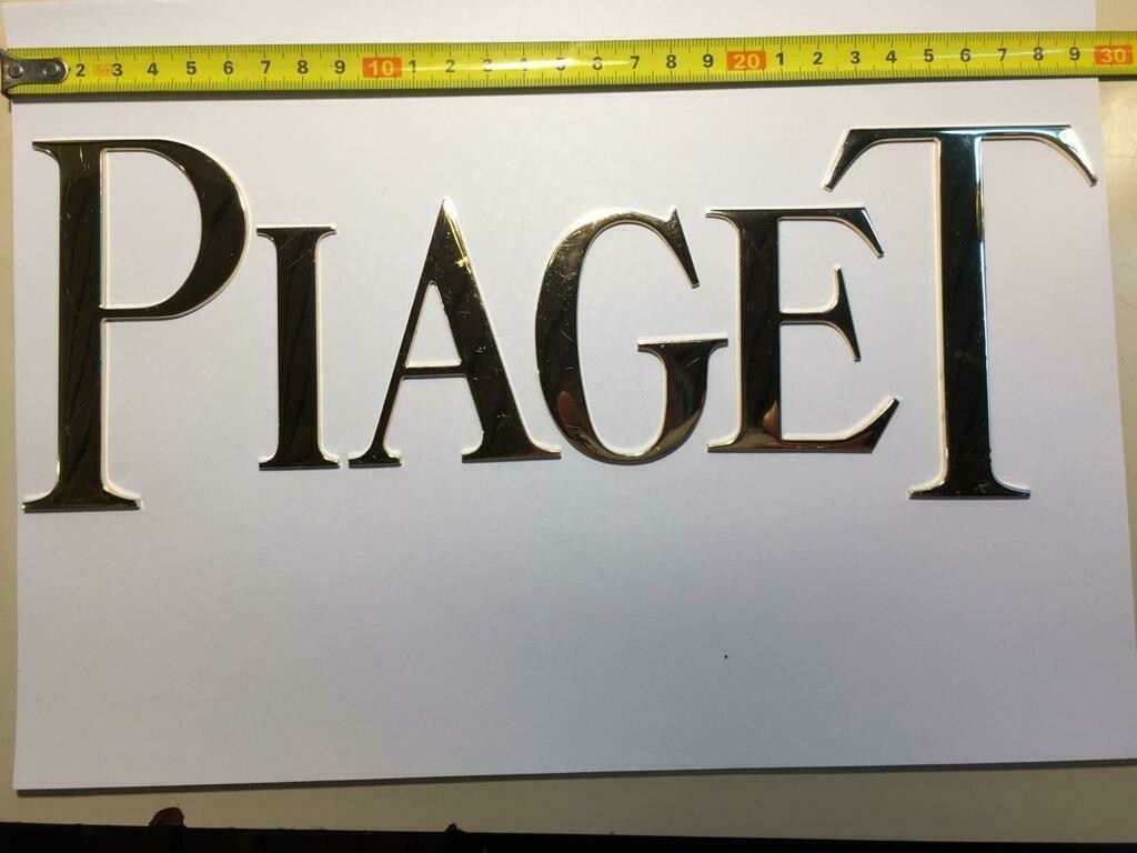 Vintage Aluminum Piaget Promotional Letters