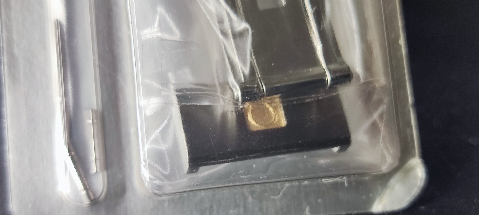 Omega steel clasp, with gold logo