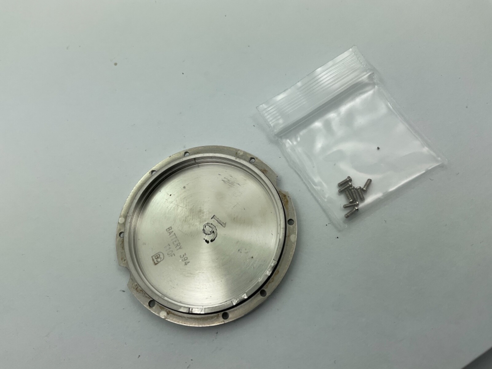 Men’s Ebel Sport Wave E1251K51 case back 37.8mm stainless steel with screws