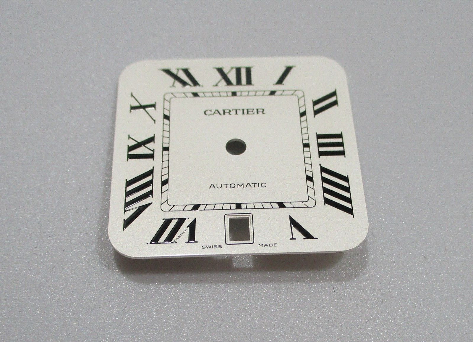 Cartier Santos White Dial Black Roman 40mm Men’s Automatic Steel Ref. WSSA0018?