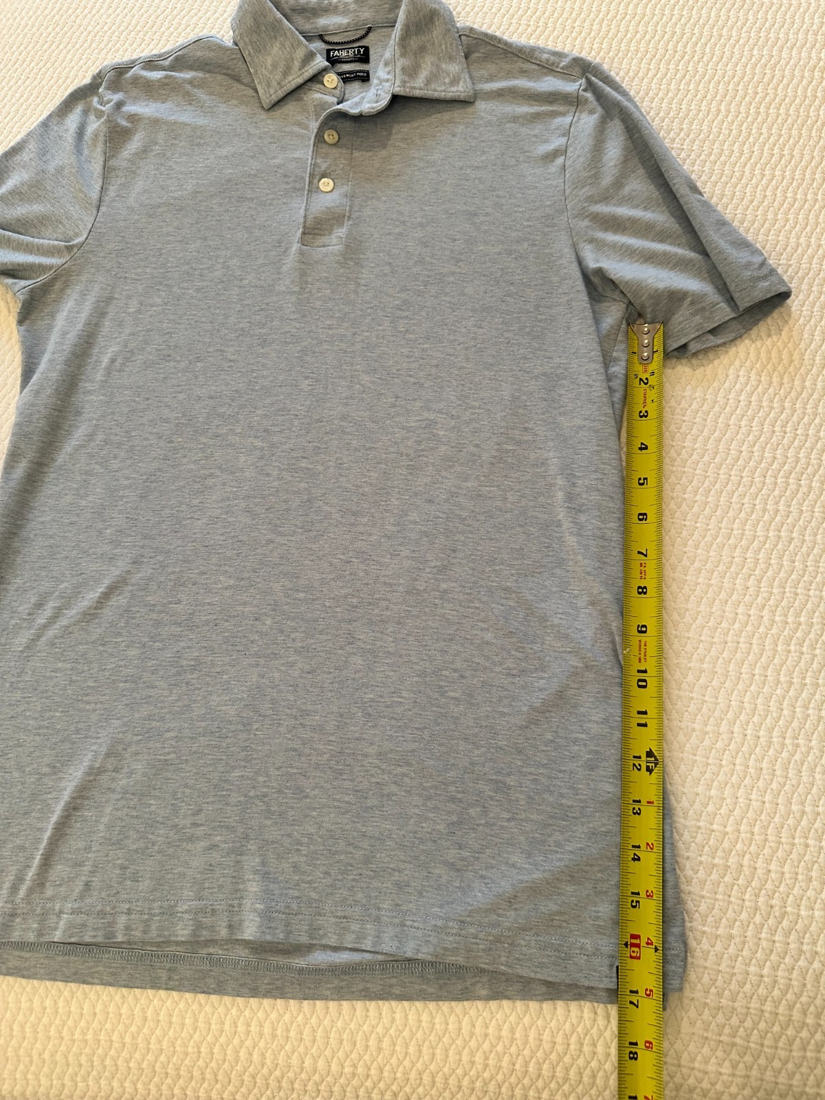 Faherty movement polo shirt, small, Cardiff Blue Heather
