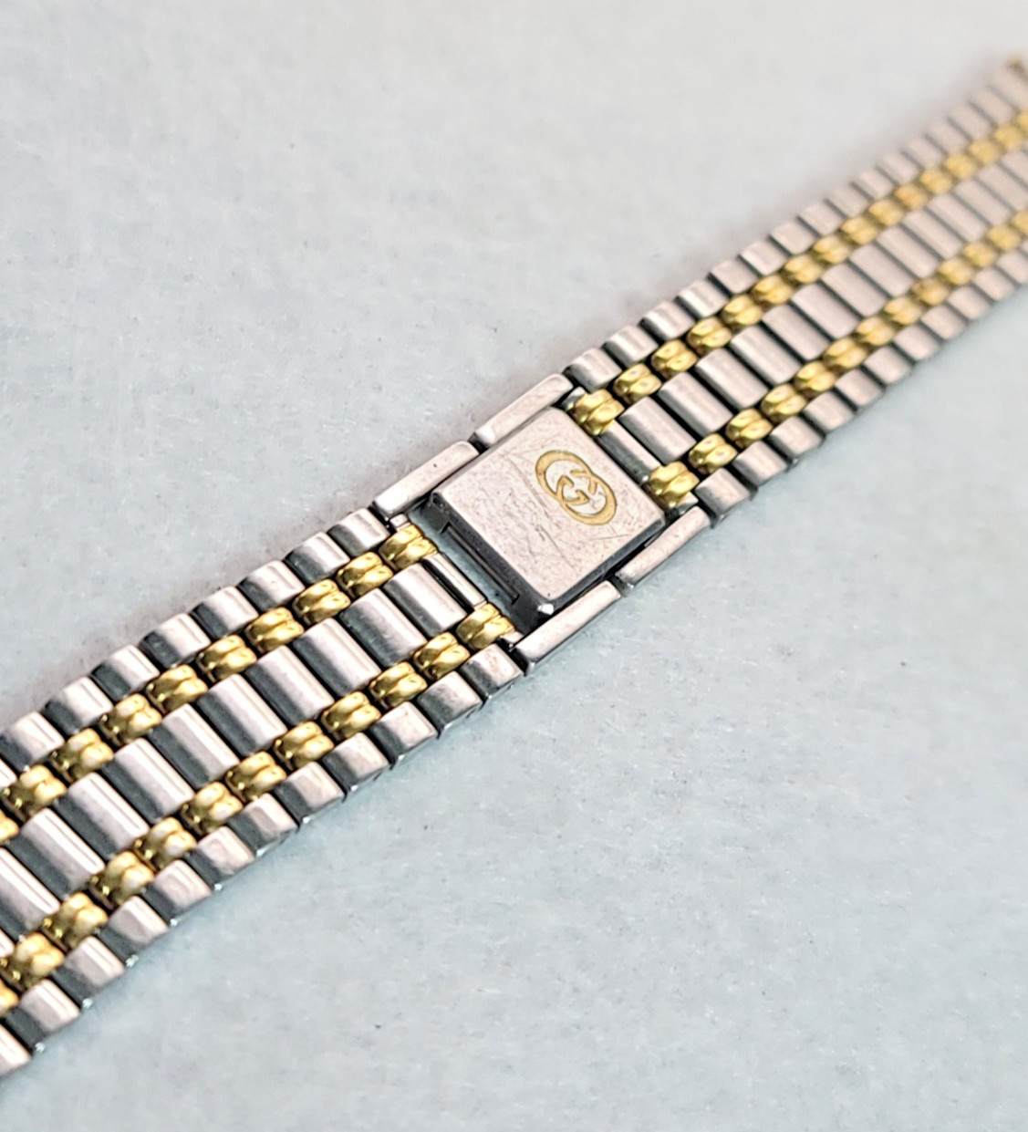 G009: Genuine Gucci 19mm Stainless Steel & Gold Plated Watch Band 7″ OEM Swiss