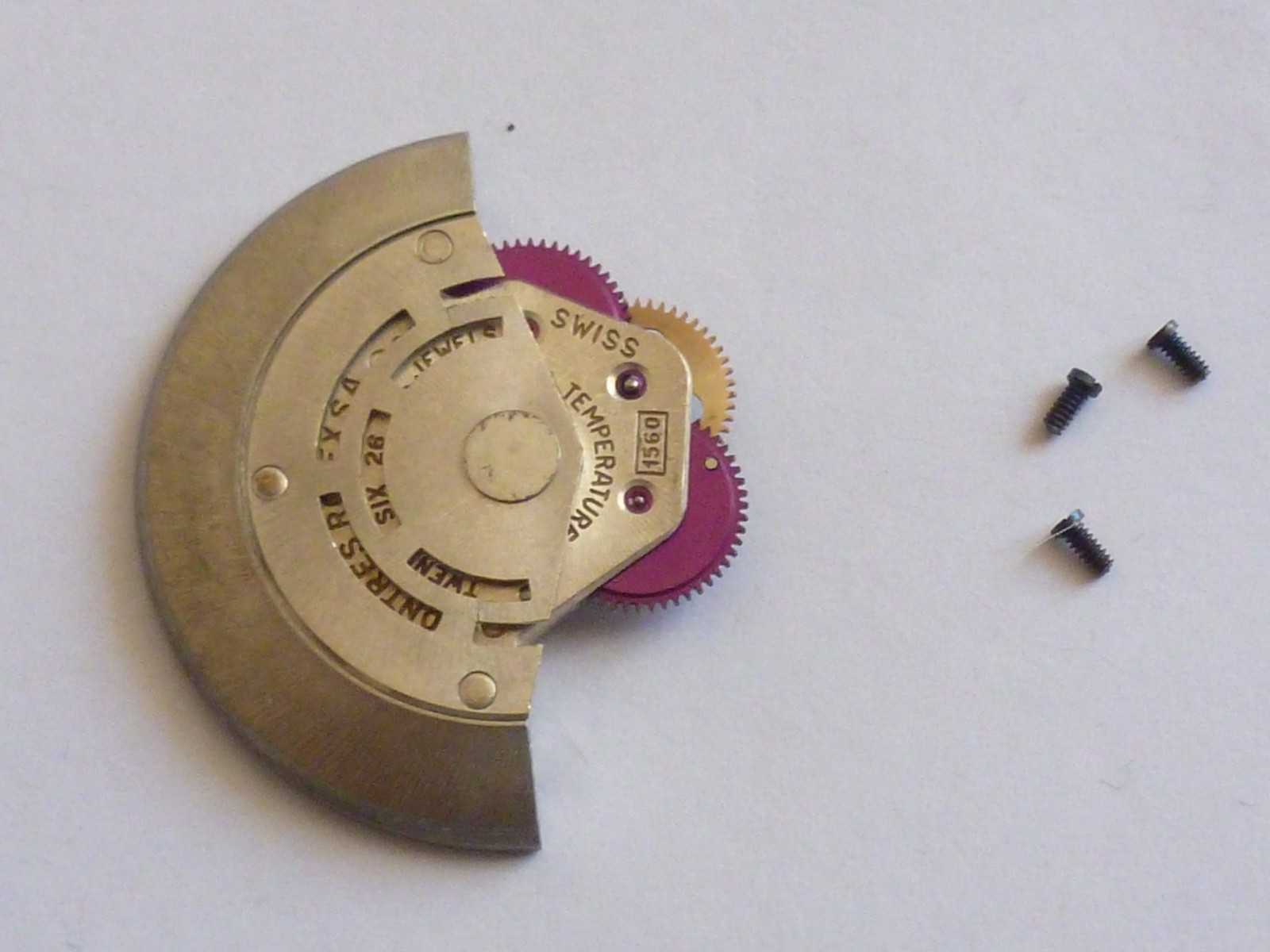GENUINE Authentic Rolex Rotor + bridge 1560 perfect condition completely screw