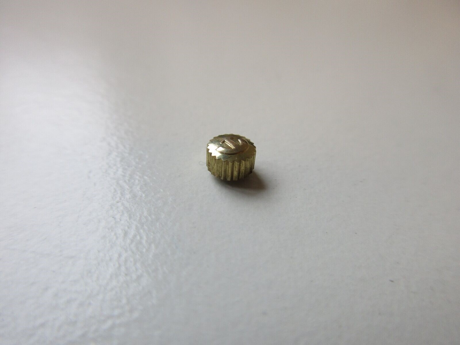 Rado N.O.S. yellow-plated watch crown ø 4.4 mm – stem thread 0.9