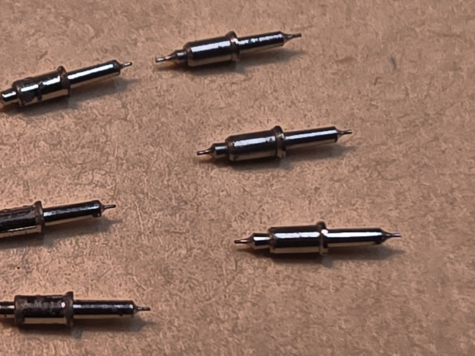 Lot Of 9 NOS Waltham 16s Model 99 Vanguard 4861 Tapered Hub Balance Staffs Parts