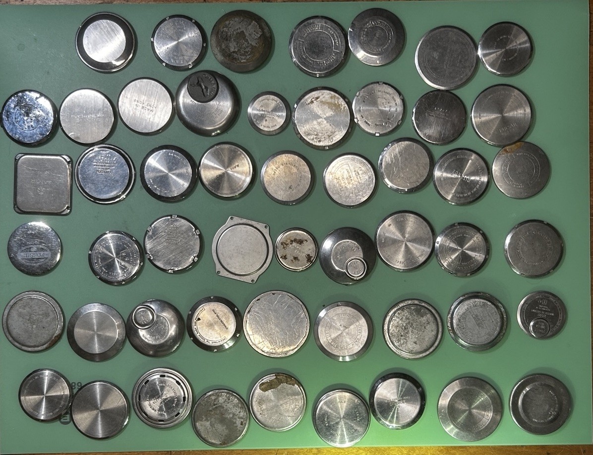 Watch Case Backs – Total of 54 – Various Brands – 1 Lot – 22.4mm – 46.8mm