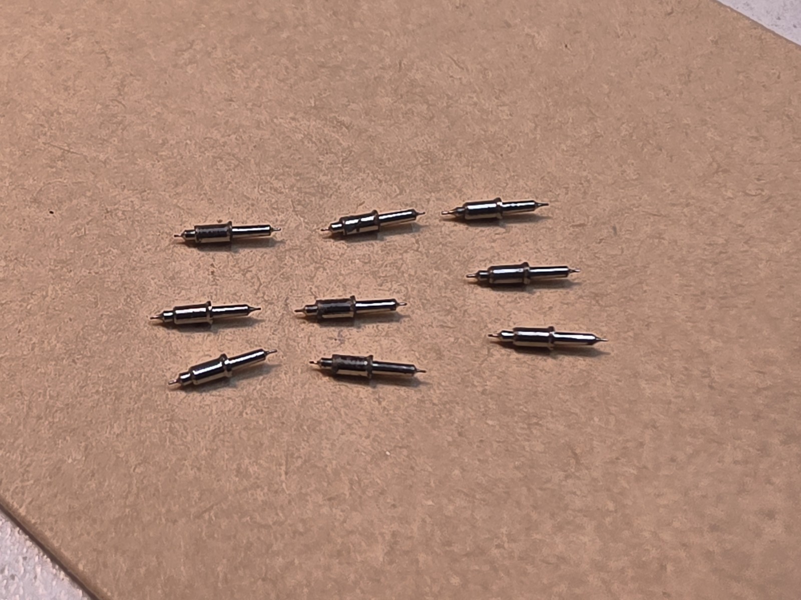 Lot Of 9 NOS Waltham 16s Model 99 Vanguard 4861 Tapered Hub Balance Staffs Parts