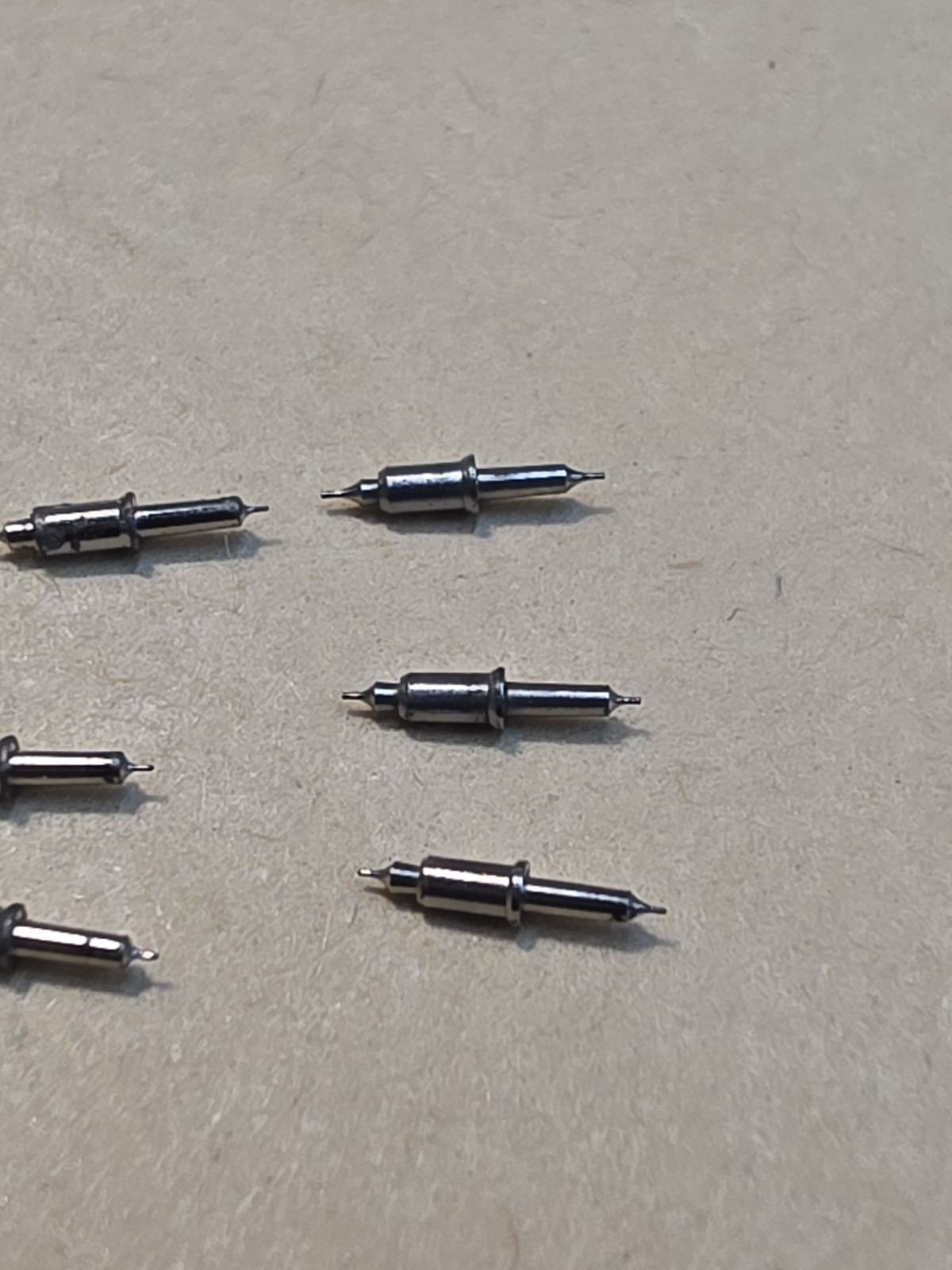 Lot Of 9 NOS Waltham 16s Model 99 Vanguard 4861 Tapered Hub Balance Staffs Parts