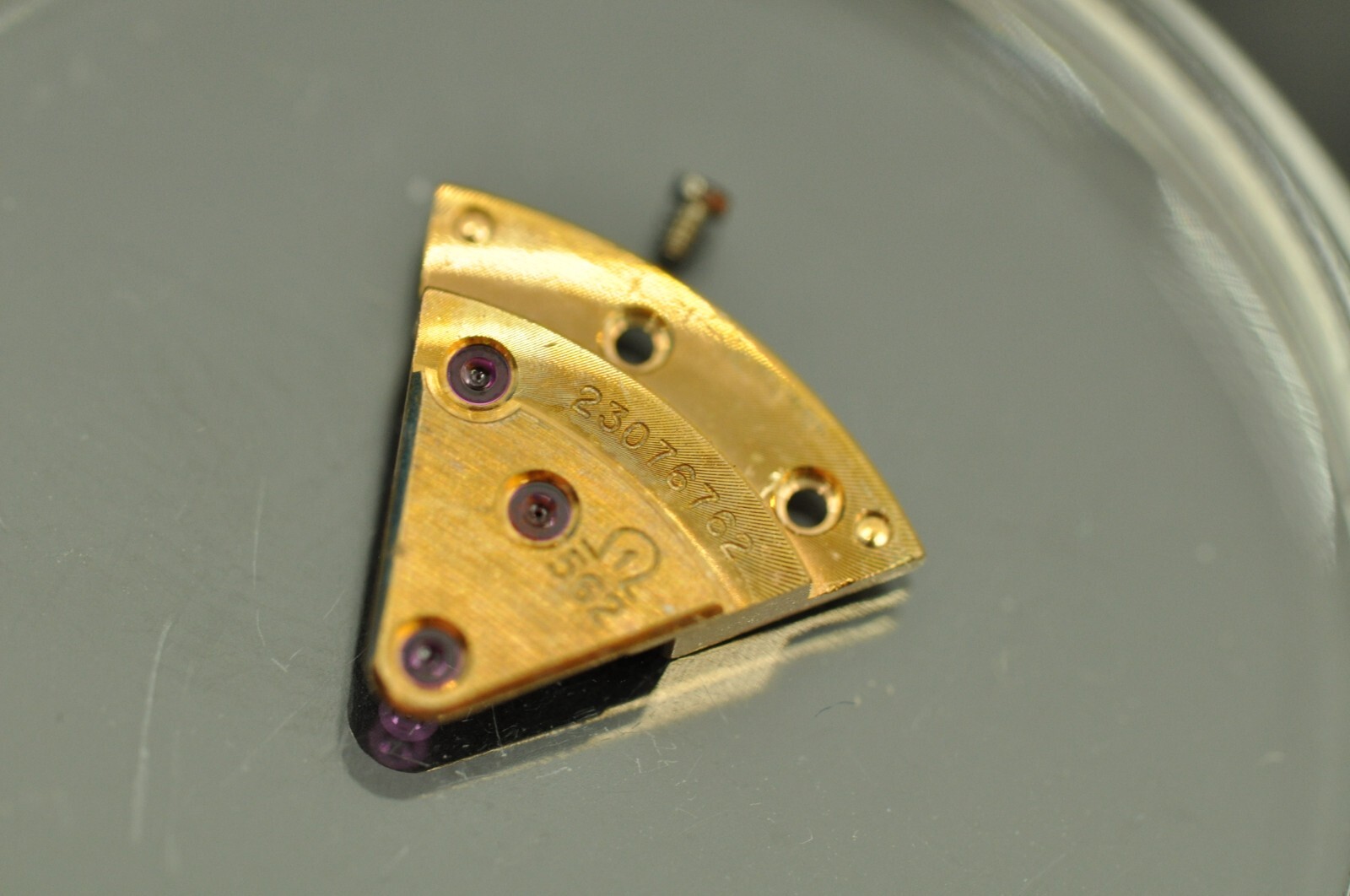Omega watch part 562-1003 train wheel bridge nice used 23xxxxxxx