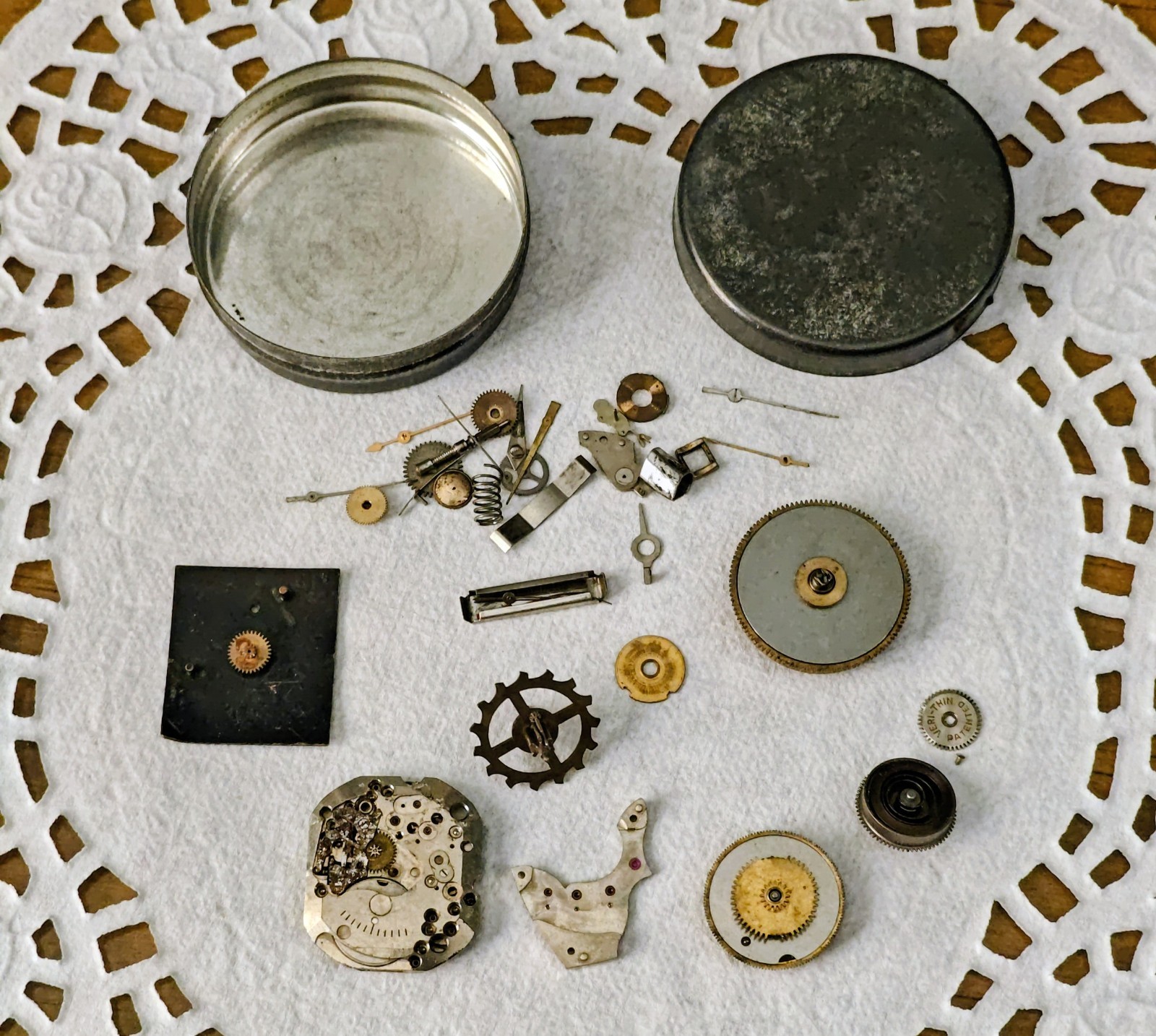 Vintage Watch Parts Including Bulova In A Small Metal Tin Can Approx 13 X 38mm