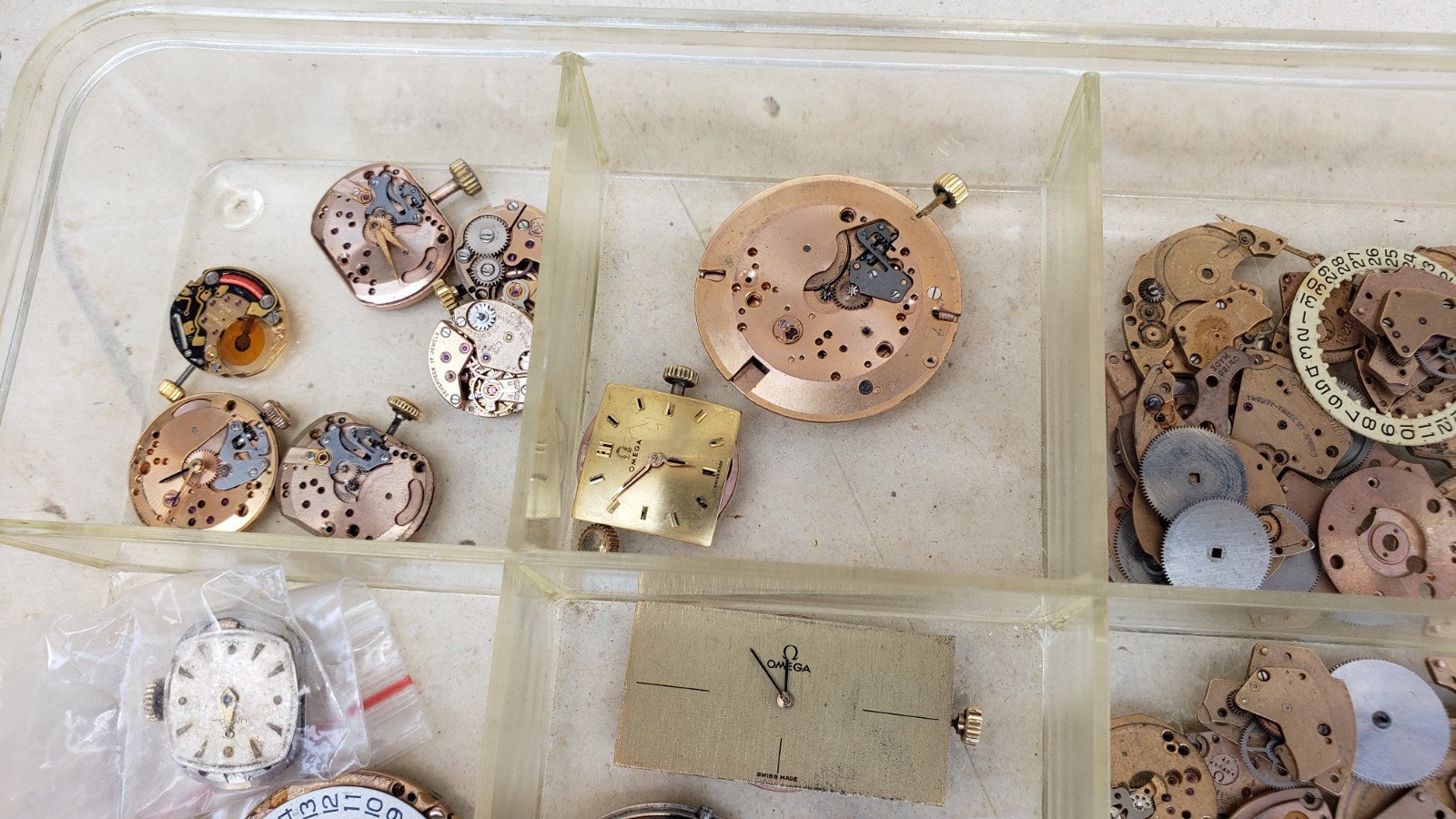 Huge Lot Of Omega Watch Movements & Dials & Parts