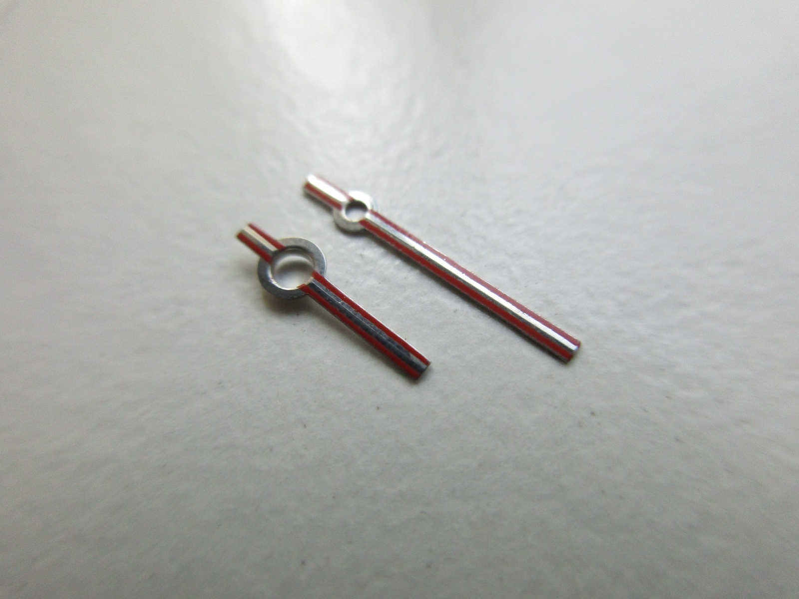 Set of 2 steel-red watch hands AS cal. 2063 – size 150/90