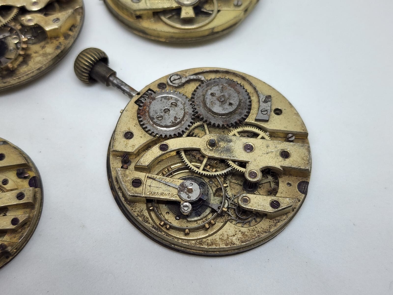 Lot of 6 high end pocket watch movements – Sold for parts – AS IS