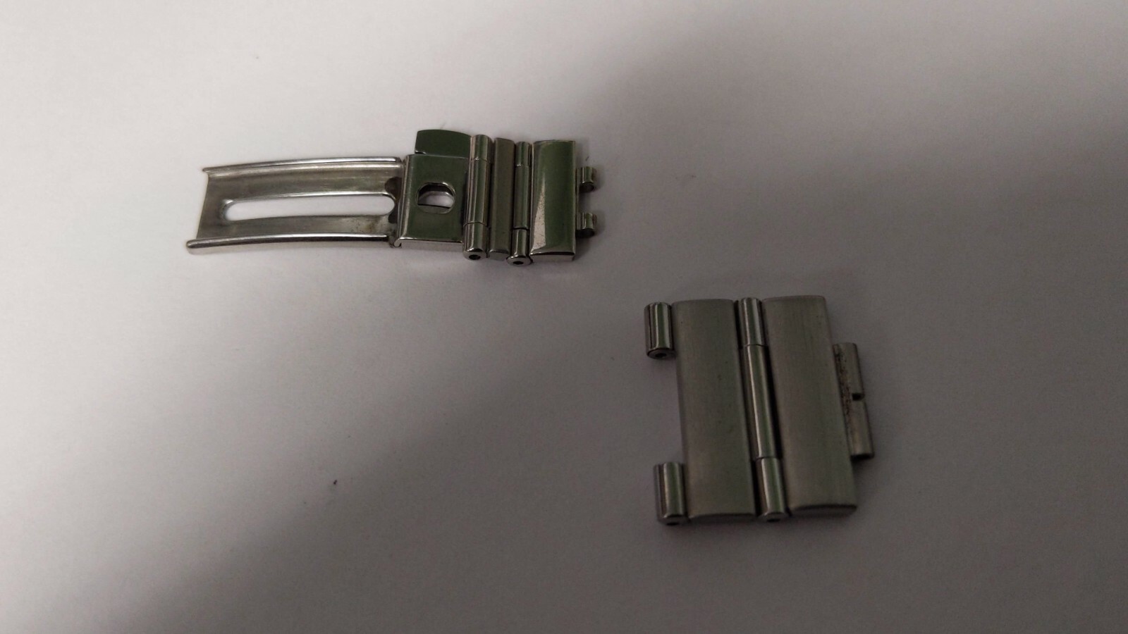 Omega LINKS S/S two pieces 18mm and one piece 12mm and clasp part. see photos. a