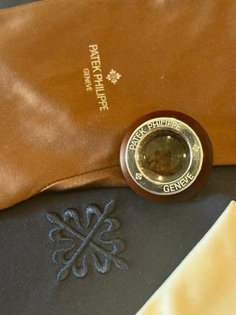 “PATEK PHILLIPPE” WOODEN LOUPE-GLOVE-NAVY BAG & STAMPED CLOTH “Price reduction!”