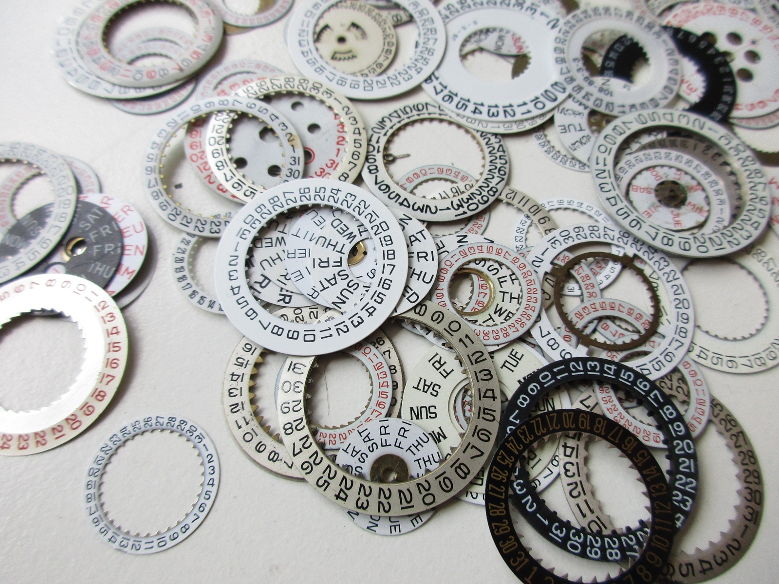 Lot of used Day and Date disks watch movement parts