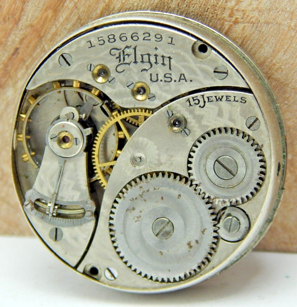 Antique 1911 Elgin 354 15 jewel 0 size hunting pocket watch movement with dial