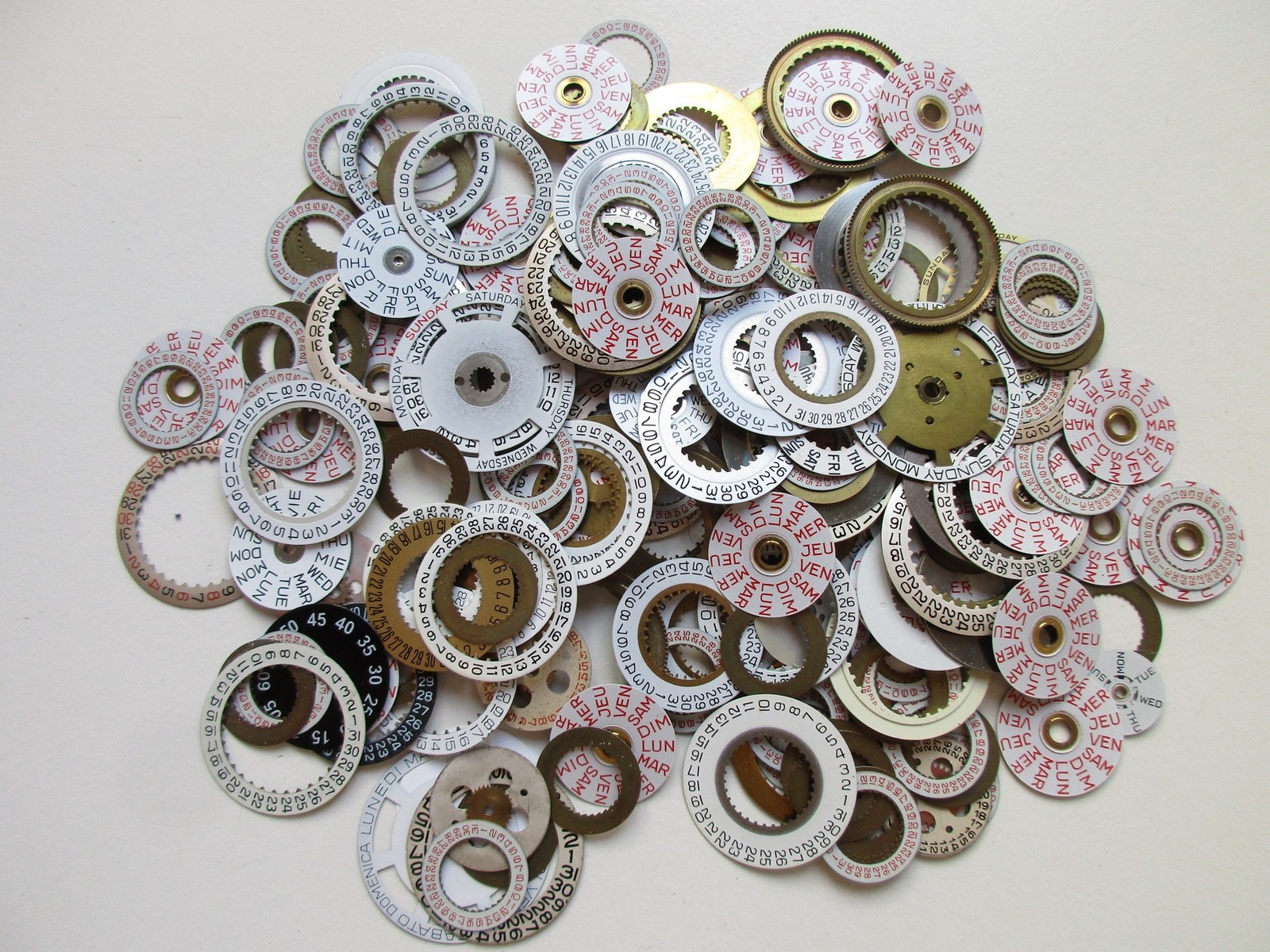 Lot of used 200+ Day and Date disks watch movement parts
