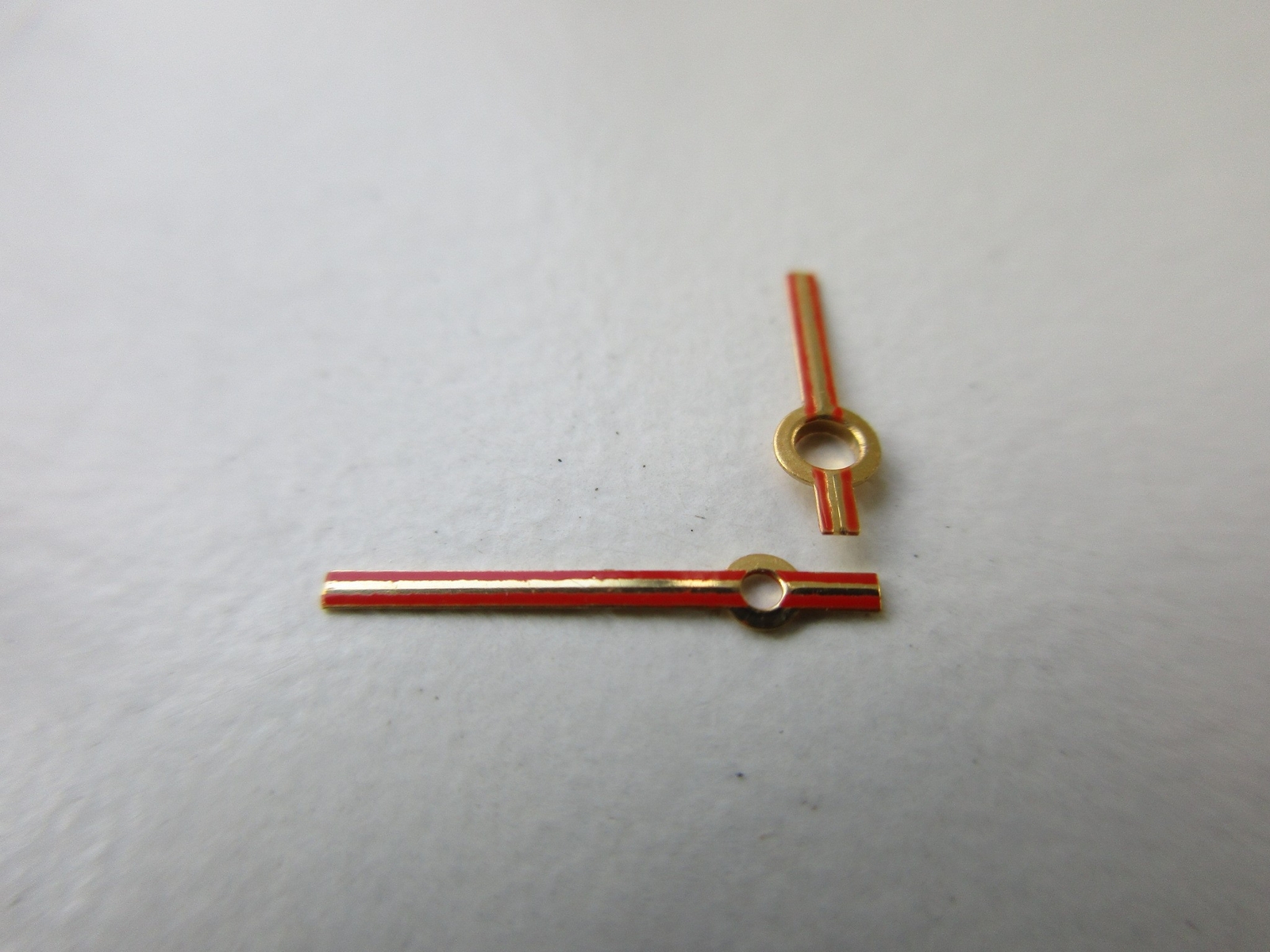 Set of plated-orange-red watch hands AS cal. 2063 – 150/90