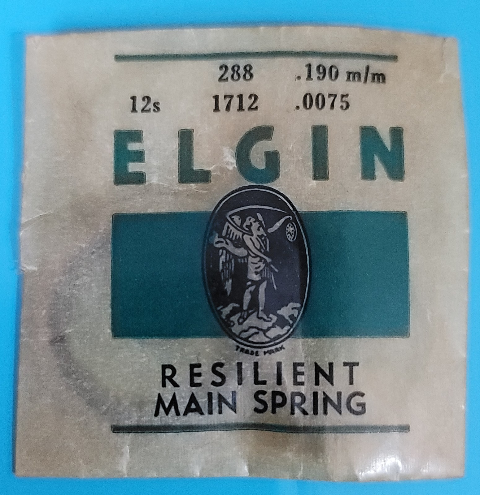 SB2-E02: (1) Elgin 12s Mainspring #288 Resilient 1712 .0075 x .190mm NOS USA