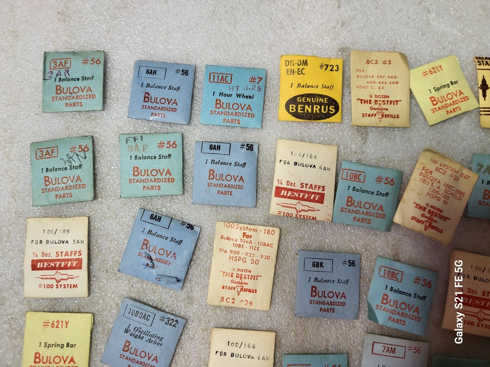 Lot of 58 Packages of Bulova Crown Staff & Balance Wheel Watch Repair Parts