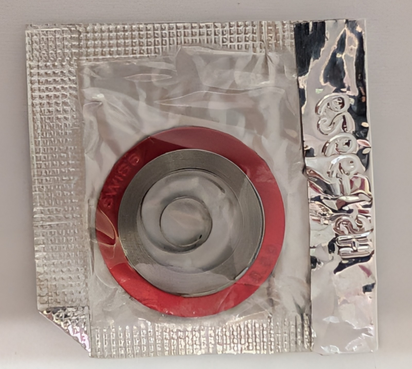 Elgin 12s white alloy mainspring