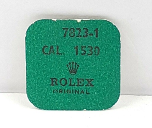 Original Rolex Part No 7823-1 Cal 1530 Foot For Train Wheel Bridge. NOS Sealed