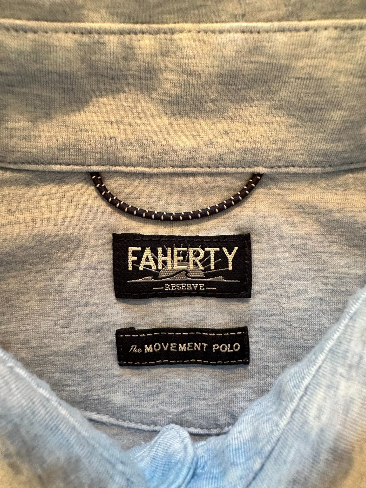 Faherty movement polo shirt, small, Cardiff Blue Heather