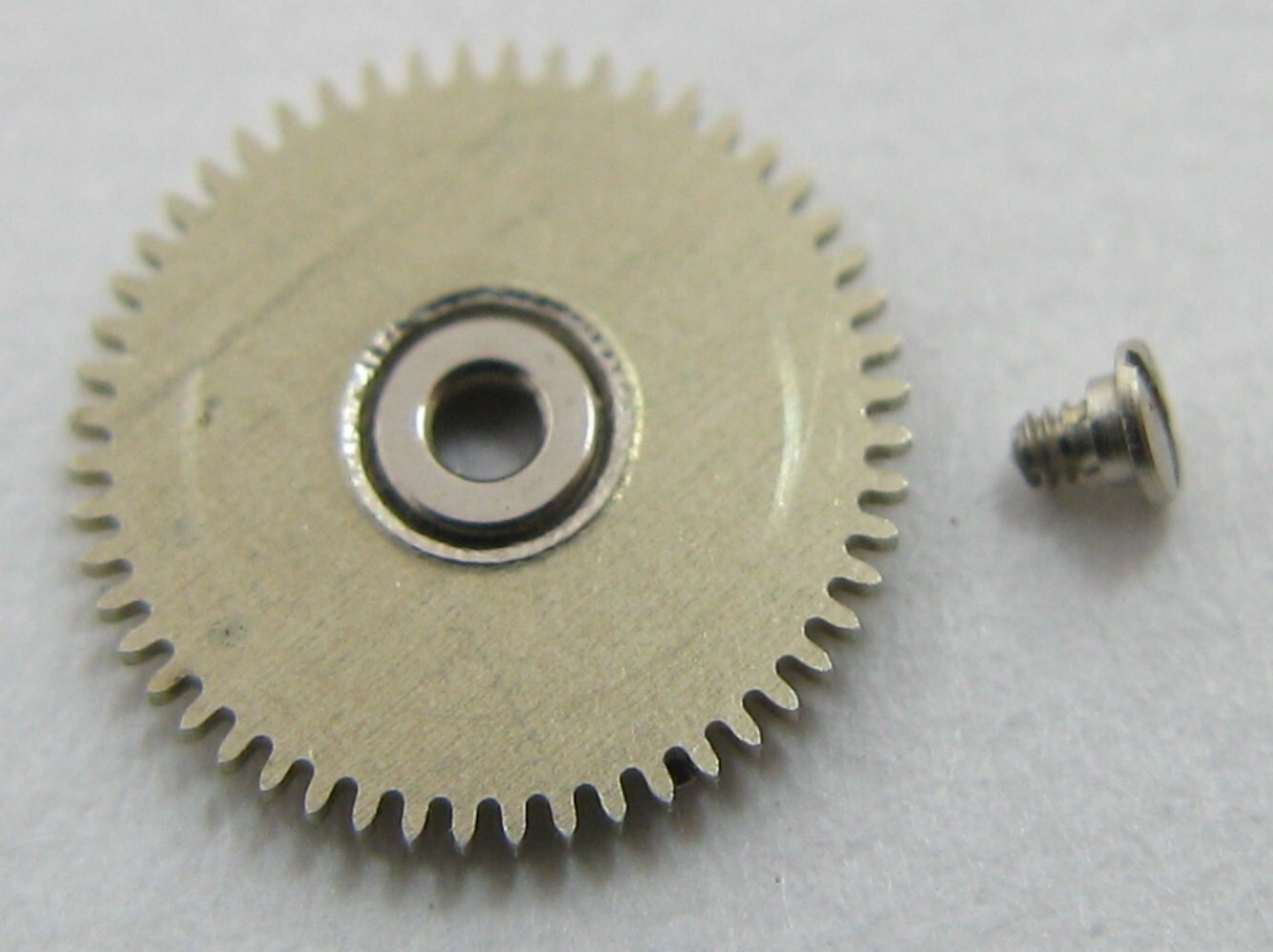 Enicar 1147 watch part: lot with calendar day driving wheel …