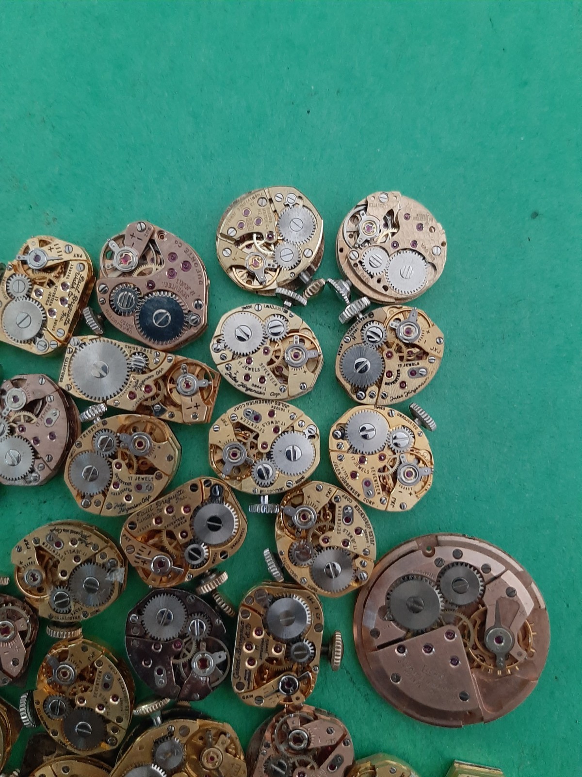 Lot of 60 Mechanical Wrist Watch Movements Parts Repair Manual Gold Cooper Tone
