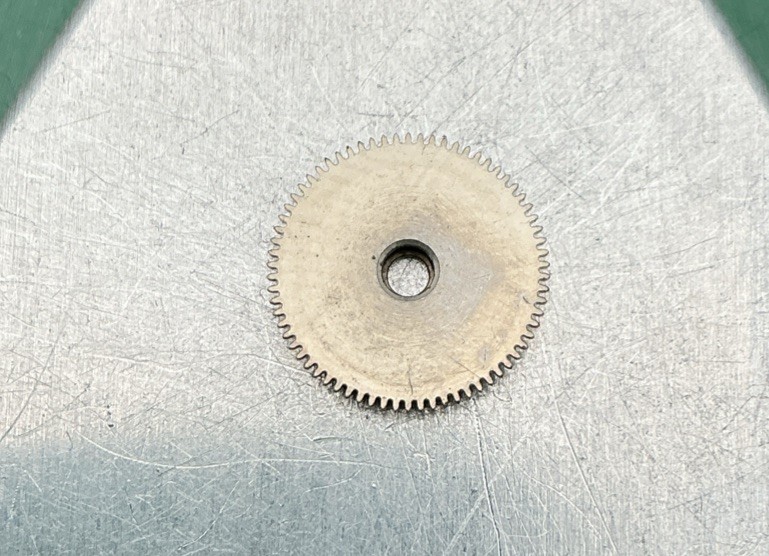 Bulova 11AF PART #1 Barrel and Cover watch parts. Preowned. (11A9)