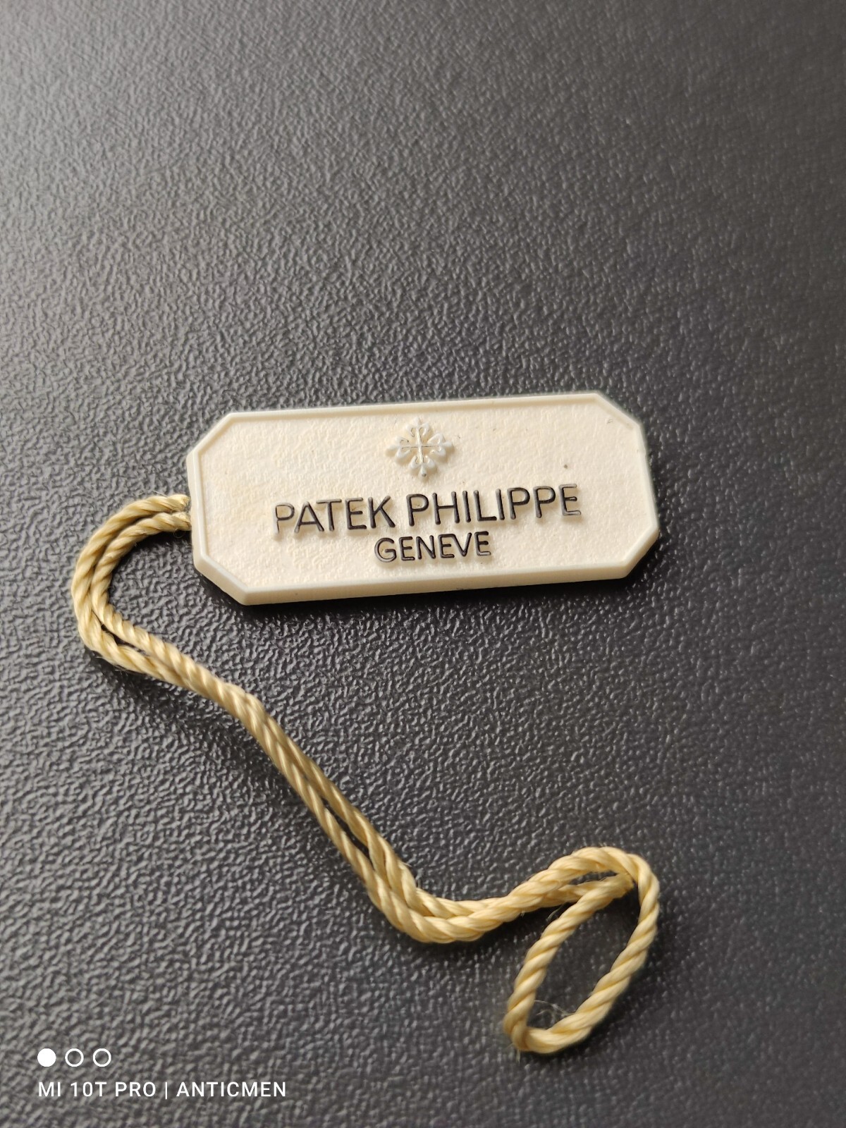 Classic White Patek Philippe Genuine Hangtag. Nice hang tag / label.