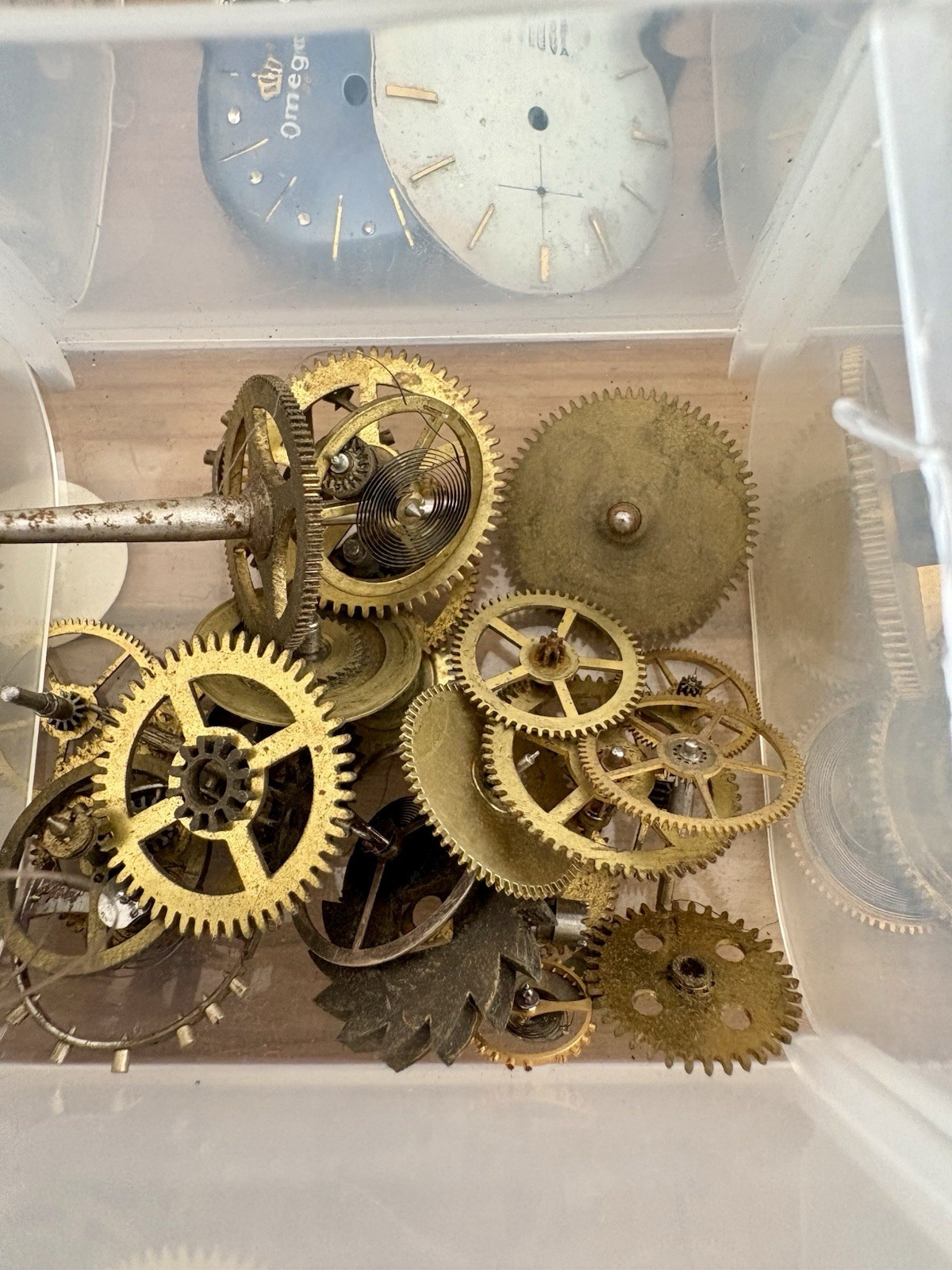 Watchmaker parts Lot w/ Box Movements Dials Gears Bulova Omega Benrus Elgin