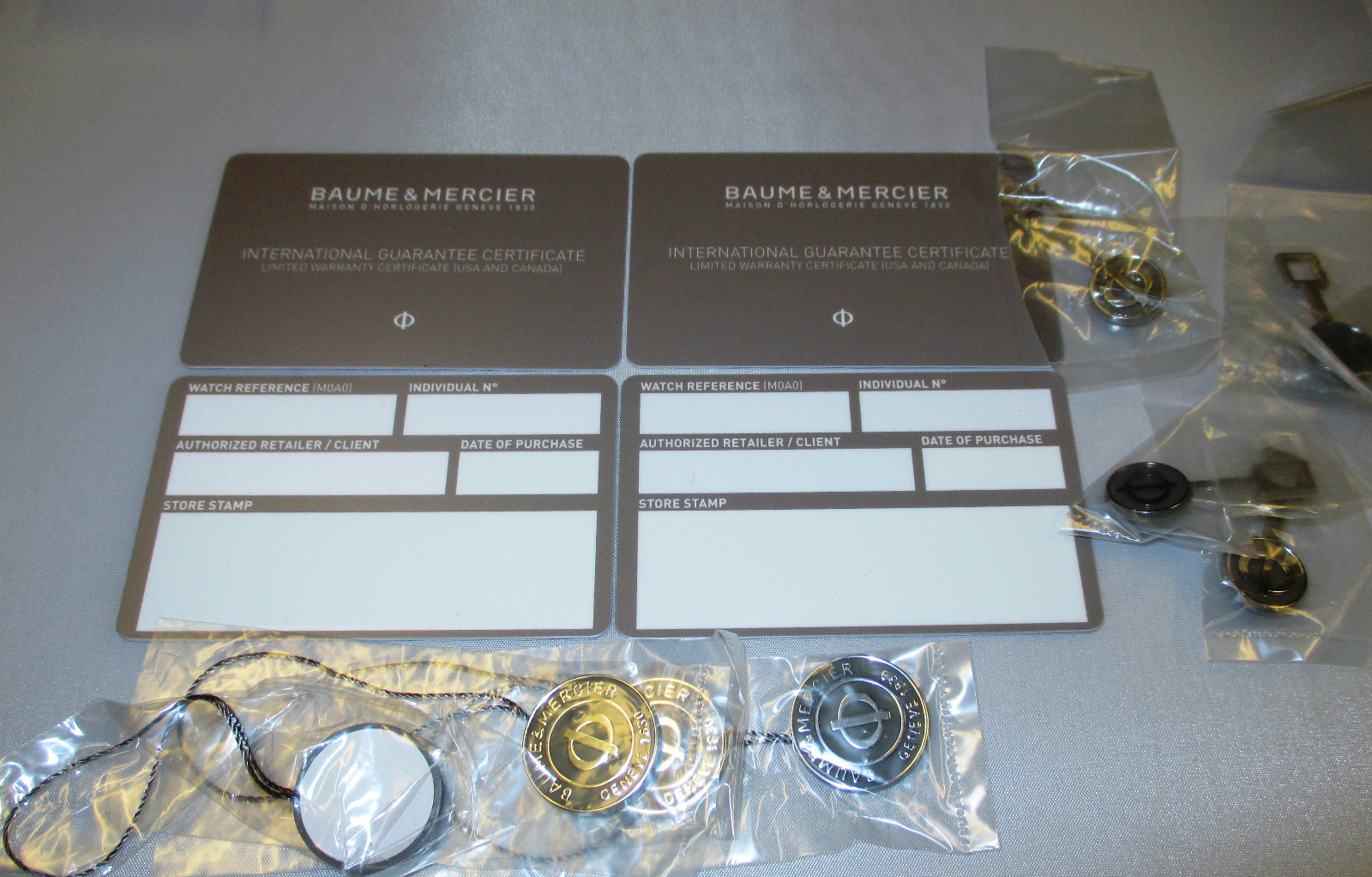 4 Baume & Mercier Watch Guarantee and Limited Warranty Certificate Cards & Tags