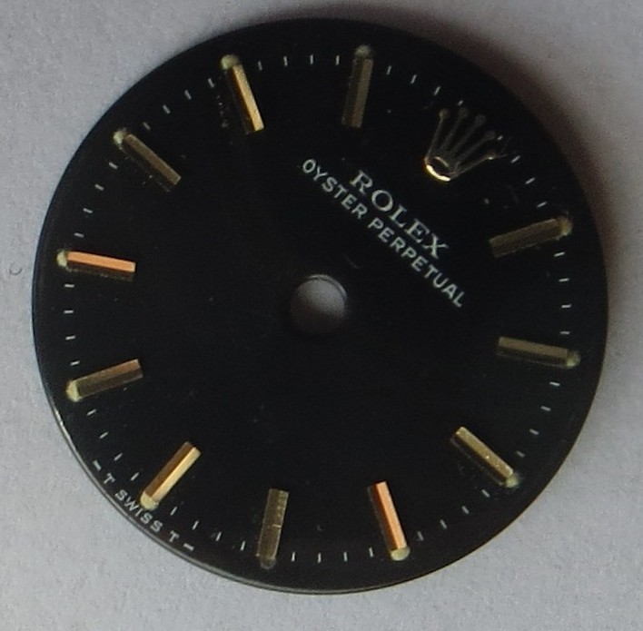 Rolex Oyster Perpetual lady wristwatch black dial 18 mm. in diameter.