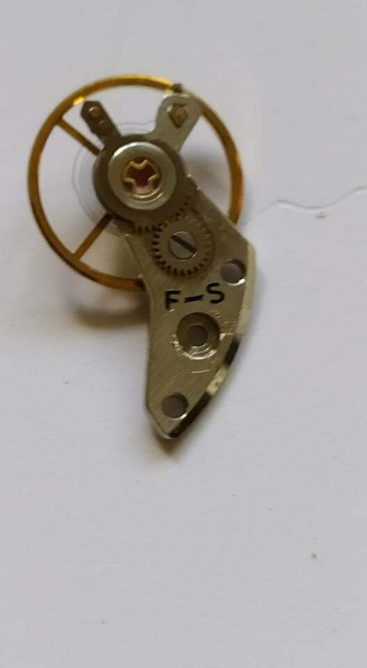 Seiko 5606 A balance wheel with a bridge – balance cock complete balance