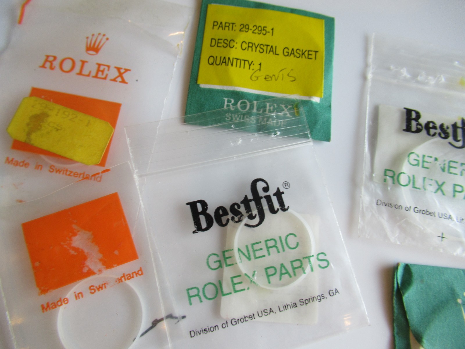 Rolex crystal gaskets hands tin box Various Misc Parts & Brands Lot sold As Is