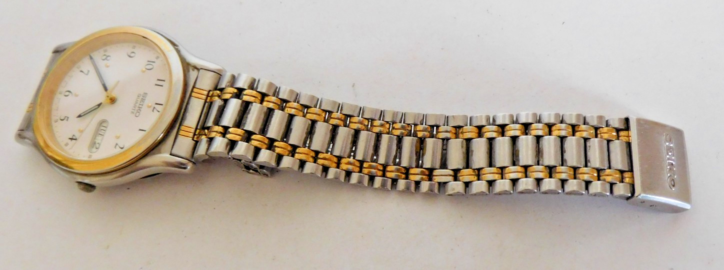 SEIKO QUARTZ DAY & DATE MOVEMENT #7N43 CASE # 7N43-7819 RUNNING. NEEDS SERVICE.